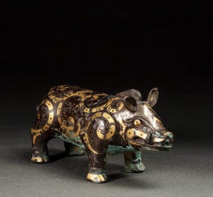 A Han Dynasty wrong gold and silver pig-shaped ornament