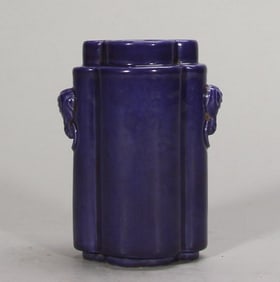 A Qing Qianlong purple glazed begonia shaped animal ear bottle