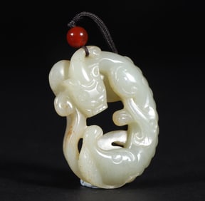 A piece of Qing Dynasty Hetian jade seed material dragon pendant