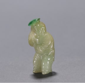 A piece of Qing jade holding lotus boy