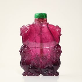 A clear rubellite double lion head snuff bottle