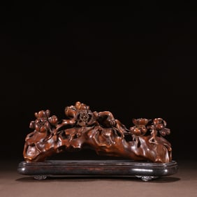 A piece of clear boxwood plum blossom ornament