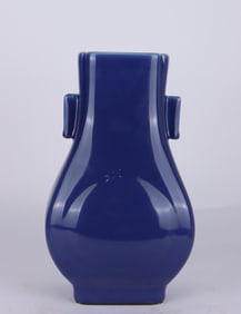 A piece of Qing Dynasty blue glazed pierced ear bottle