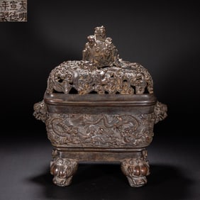 A piece of bronze lion head ear smoker