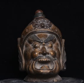 A piece of bluestone color stewed martial god wrestler Buddha head