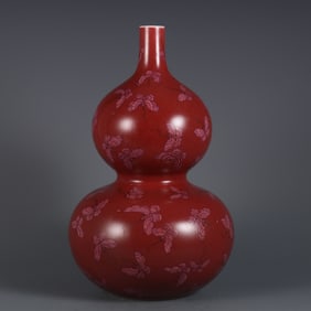 A piece of Qianlong in the Qing Dynasty made Ji red glaze with pastel hundred butterfly pattern
