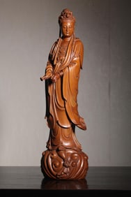 A small-leaved boxwood net bottle statue of Guanyin