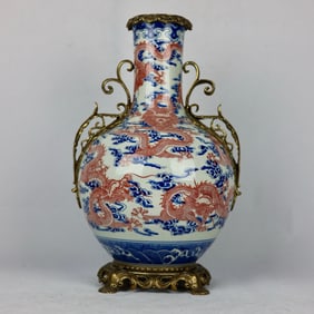 A blue and white glazed red cloud dragon pattern inlaid with copper lace amphora celestial globe