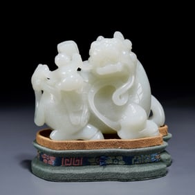 A Hetian jade unicorn book ornament