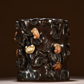 A Qing Dynasty rosewood inlaid hibiscus stone carving Ruyi pattern pen holder
