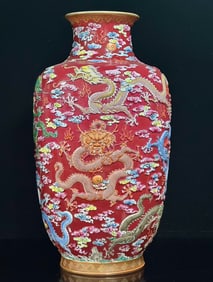 One piece of Qing Qianlong: pastel carmine carved nine dragon pattern donggua bottle