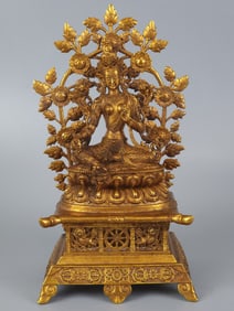 A piece of bronze gilt Buddha