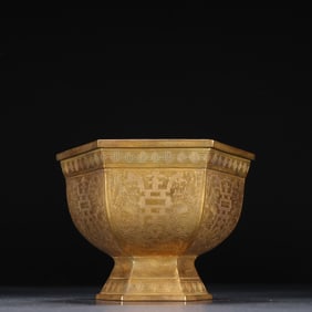 A piece of Qing Dynasty bronze gilt chisel longevity pattern hexagonal cup