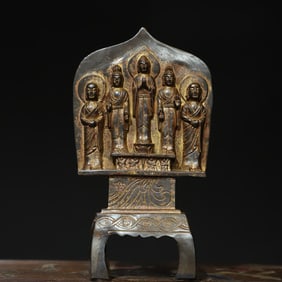 A bronze and gold [Northern Wei Buddha] Buddha statue