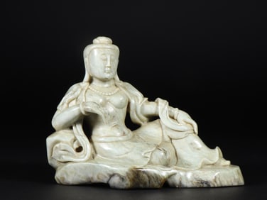 A Ming Dynasty Hetian jade chicken bone white Bodhisattva ornament