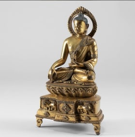 A piece of Qing Dynasty gilt Sakyamuni