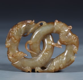 A piece of Qing Dynasty Hetian jade seed material dragon and phoenix pendant