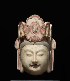 A piece of white marble Buddha head