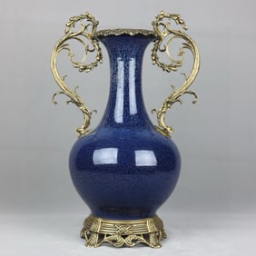 A snowflake blue binaural bottle with copper lace
