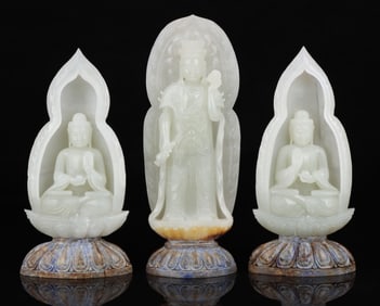 A set of Hetian jade three holy Buddha statues