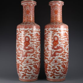 A pair of large stick bottles made in the Qing Jiaqing year with alum red painted gold nine dragon