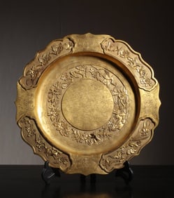 A piece of Qing Qianlong bronze gilt sunflower tribute plate
