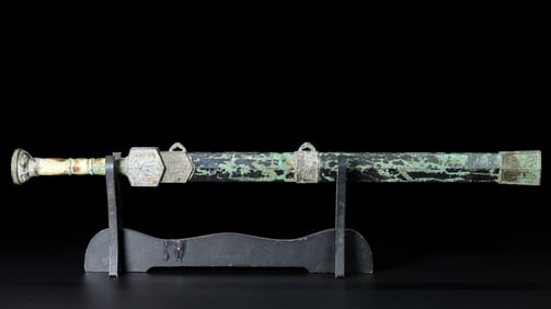 A piece of Hetian jade patina sword with warped