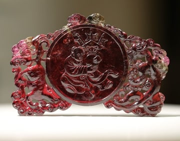 A piece of Qing Dynasty tourmaline is safe and auspicious, and the dragon and tiger stripes are