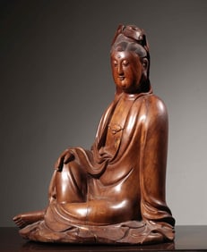 A Qing Dynasty longan wood statue of Guanyin