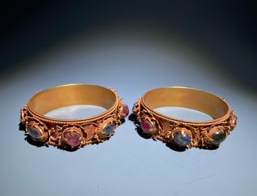 A pair of Ming Dynasty gold and gemstone bracelets
