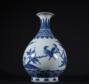 A Qing Dynasty Yongzheng blue and white flower and bird pattern jade pot spring vase