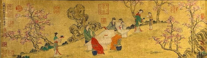 A long scroll of the Ming Dynasty Tang Yin's fine silk brocade mounted peach and plum night banquet