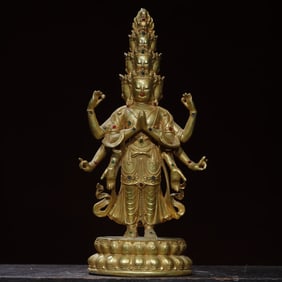 A Buddha statue bronze gilt inlaid with gems [Thousand Hands Guanyin] Buddha statue