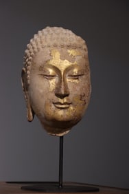 A piece of Northern Qi white marble Buddha head