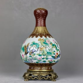 A piece of pastel relief lotus pond fun depiction gold inlaid copper bottom garlic bottle