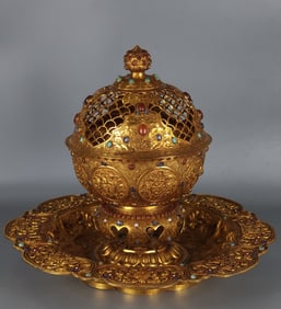 A bronze gilt engraved auspicious eight-treasure incense ornament