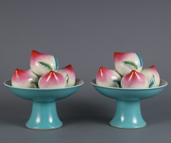 A pair of Qing Qianlong year enamel color longevity peach high foot bowl