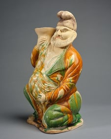 An ancient Tang Sancai Hu people hugging geese