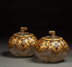 A pair of Liao Dynasty crystal-filled gold Go jars