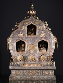 An old collection of silver-gilt Buddha shrines