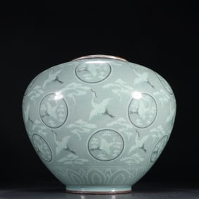 A piece of Korean porcelain with silver and gilt crane pattern jar
