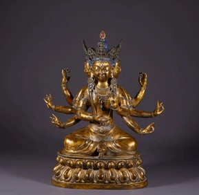 A piece of copper-gilt eight-armed Tara