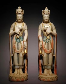 A pair of Northern Qi white marble gold-painted bodhisattvas