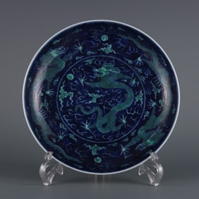 A piece of Qing Guangxu year blue and white blue ground green color cloud dragon pattern plate