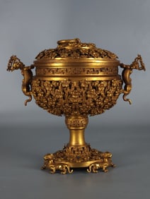 A piece of copper-gilt beanware