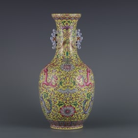 A  piece of Qianlong in the Qing Dynasty made yellow ground pastel red dragon wearing flowers