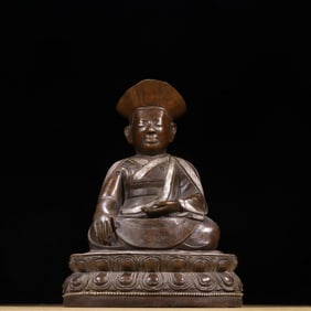 An early Qing Dynasty alloy copper inlaid with silver Guru Buddha