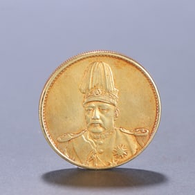 One silver-gilt coin