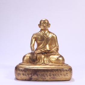 A Qing Dynasty bronze gilt Buddha statue