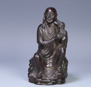 A Qing Dynasty rosewood arhat ornament